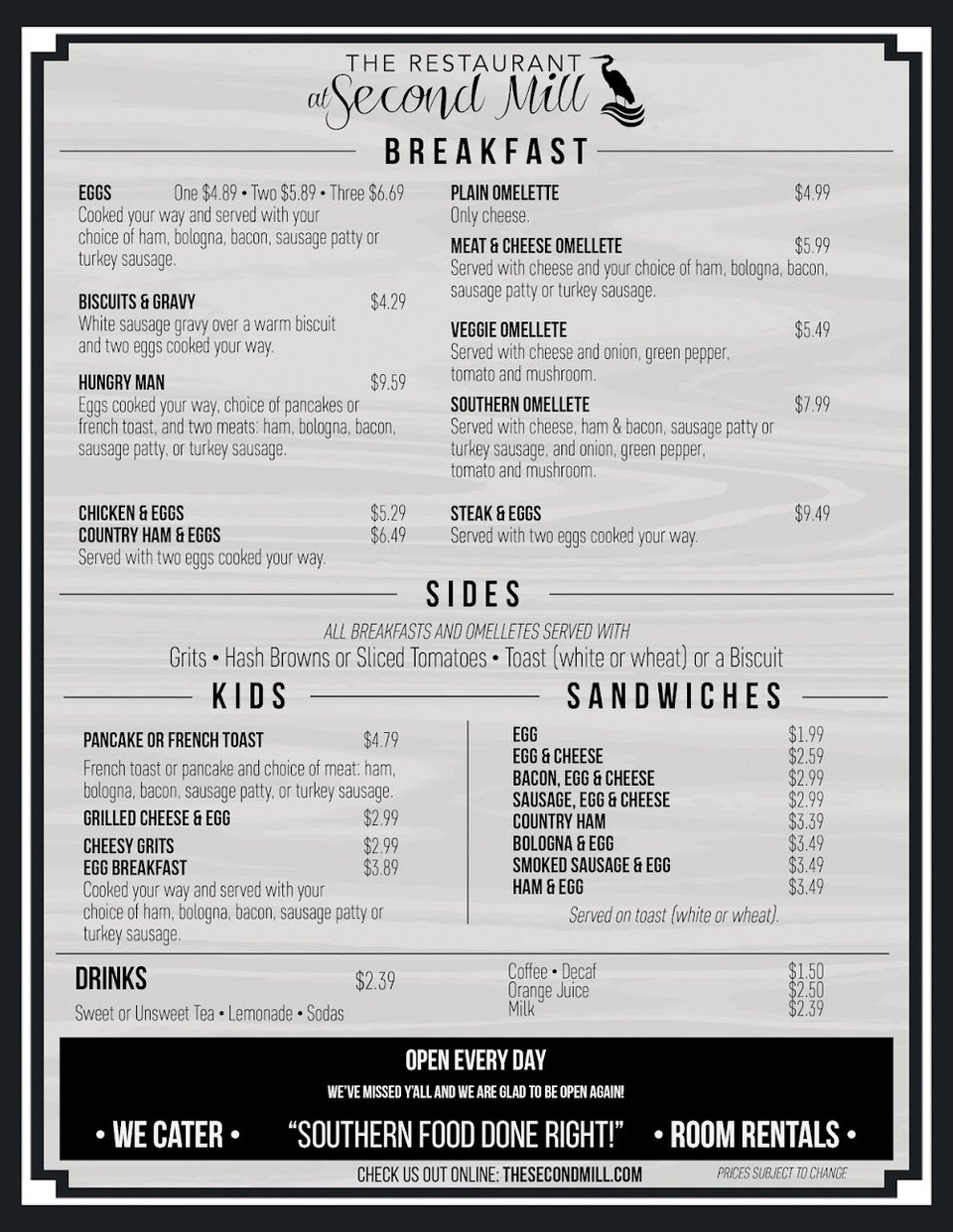 Menu page beside a restaurant table.